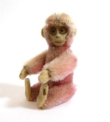 Lot 2028 - Schuco Pink Plush Monkey Scent Bottle, with removable head revealing a glass vial with stopper,...
