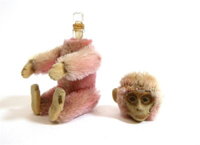 Lot 2028 - Schuco Pink Plush Monkey Scent Bottle, with removable head revealing a glass vial with stopper,...