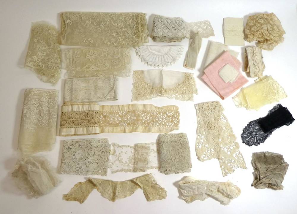 Lot 2033 - Assorted Lace, including a net flounce with floral embroidery; length of appliqué lace bearing...