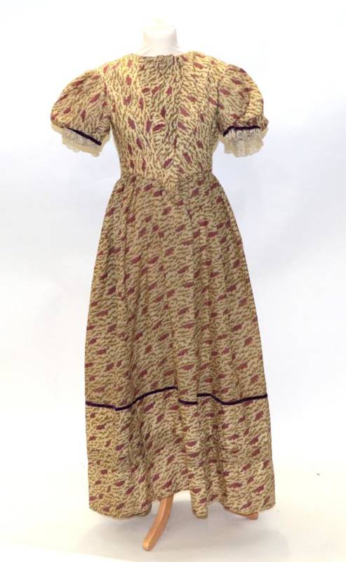 Lot 2064 - A Victorian Fine Wool Dress, printed with an unusual design in mauve, red and  moss green, with...