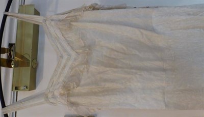 Lot 2066 - Assorted Early 20th Century Silk and Lace Wedding Gowns, comprising a long sleeved dress with...