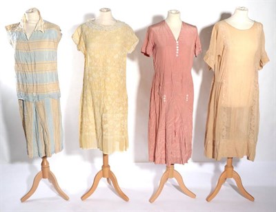 Lot 2074 - Circa 1920s Day Dresses, comprising a yellow muslin short sleeve drop waist dress, with cream...