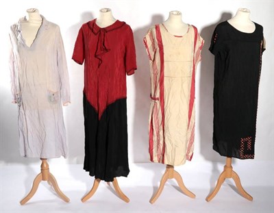 Lot 2075 - Circa 1920s Day Dresses, comprising a black crepe short sleeve shift dress with scoop neck,...
