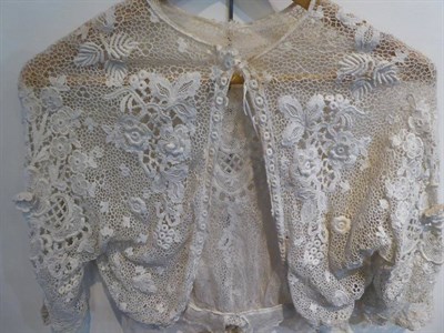 Lot 2080 - Edwardian Irish Crochet Lace Blouse, with raised flower heads, elbow length sleeves, round...