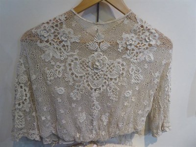 Lot 2080 - Edwardian Irish Crochet Lace Blouse, with raised flower heads, elbow length sleeves, round...