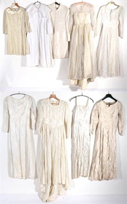 Lot 2105 - Circa 1940/60s Wedding Dresses and Coats, comprising an Emenson silk brocade long sleeved dress...