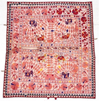 Lot 2151 - An Indian Wedding Panel, embroidered with purple elephants and other animals, within a red and blue