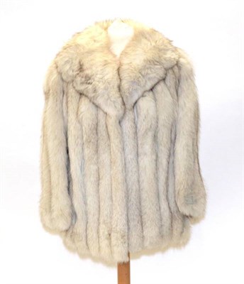 Lot 2196 - A Ross Furriers Leeds Arctic Fox Fur Jacket, with light grey leather inserts between the pelts,...