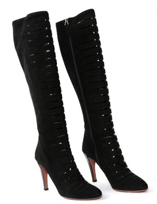 Lot 2210 - Pair of Alaïa Black Suede High Heeled Knee High Boots, with open-work patent leather graduated...