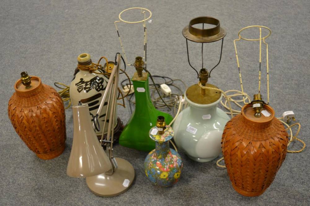 Lot 1091 - A group of assorted table lamps including a pair of wicker examples, Oriental style examples and an