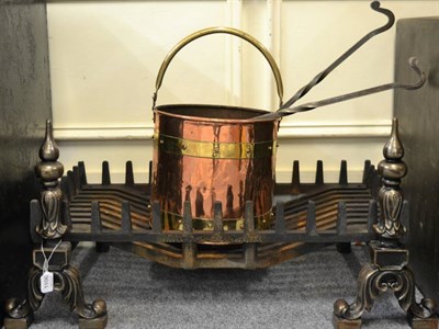 Lot 1106 - A large firegrate comprising pair of andiron supports and basket; together with copper and...