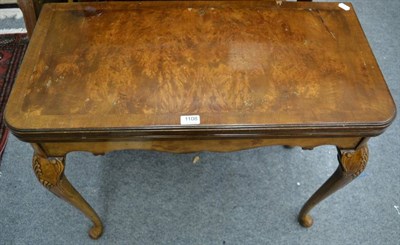 Lot 1108 - A 1920s fold over card table