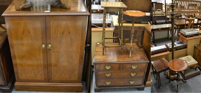 Lot 1111 - A group of reproduction furniture comprising: a music cabinet; a television stand; a nest of...