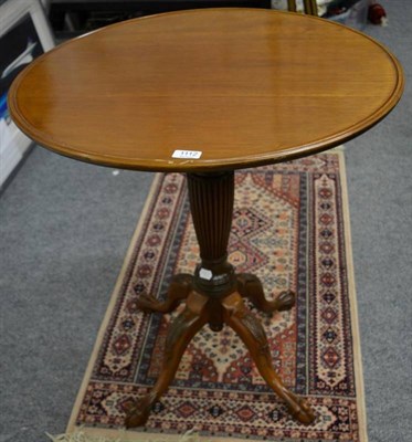 Lot 1112 - A reproduction dish topped occasional table, with reeded baluster standard, raised on ball and claw