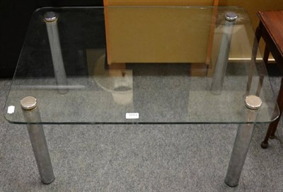 Lot 1113 - A glass coffee table