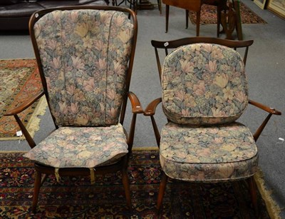 Lot 1130 - A small stick back Ercol chair together with a larger stick back chair (a.f.) (2)