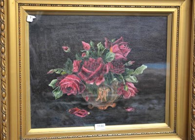 Lot 1146 - J C Milbourne (20th century), Roses in a vase decorated with putti, signed, oil on canvas
