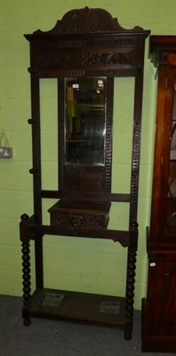 Lot 1187 - A Victorian carved oak hall stand