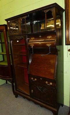 Lot 1193 - A late 19th century combination bureau/display cabinet