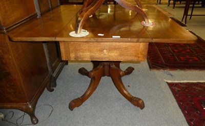 Lot 1197 - A mahogany Pembroke table with single drawer, the ring turned column on four reeded supports