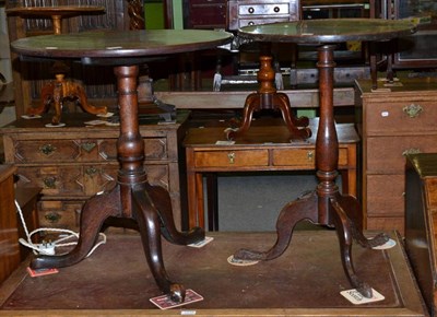 Lot 1217 - Two 19th century oak circular tripod tables