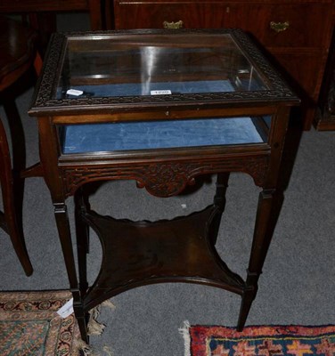 Lot 1220 - A carved mahogany bijouterie table, 49cm wide