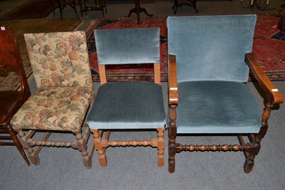 Lot 1231 - An oak open armchair with two similar side chairs (3)