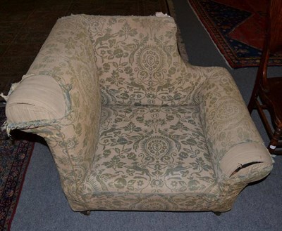 Lot 1233 - A 19th century upholstered corner chair, mahogany legs to castors