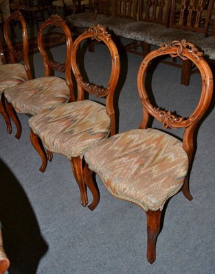 Lot 1235 - Set of five Victorian carved walnut salon chairs