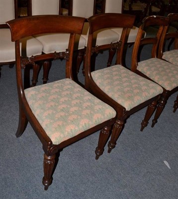 Lot 1243 - A set of six 19th century rosewood dining chairs, each with gadrooned legs, together with a similar