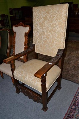 Lot 1249 - A carved walnut open armchair, late 19th century, in 17th century style, recovered in yellow...