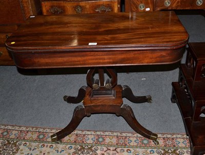 Lot 1255 - A Regency mahogany foldover tea table, early 19th century, of demi-lune shaped form with plain...