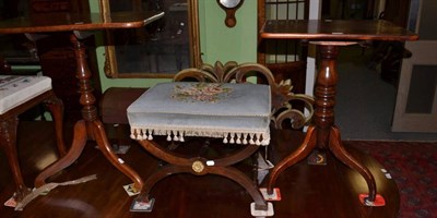 Lot 1273 - Two 19th century mahogany tilt top tripod tables and a mahogany X-frame piano stool (3)