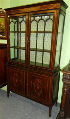 Lot 1291 - An Edwardian inlaid mahogany display cabinet