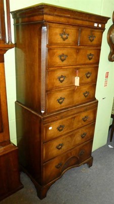 Lot 1298 - A George I style reproduction tallboy with inverted inlaid starbursts to bottom drawer