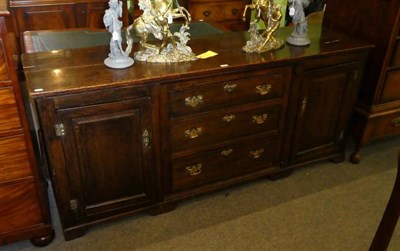 Lot 1307 - A George III provincial oak dresser base