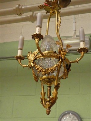 Lot 1310 - A gilt metal and cut glass hanging light fitting