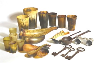 Lot 25 - A group of horn beakers, various sizes; together with various horn, bone and treen spoons;...