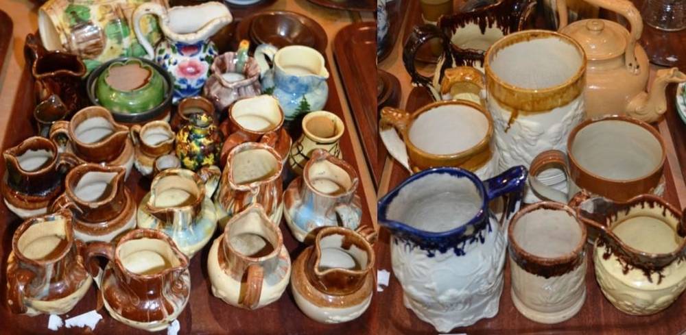 Lot 32 - A quantity of assorted stoneware mugs, jugs and other items, to include many miniature...