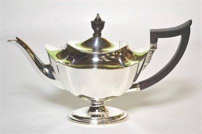 Lot 41 - A silver pedestal teapot, Thomas Bradbury & Sons, London 1913, shaped oval form, 26cm long, 14.1ozt