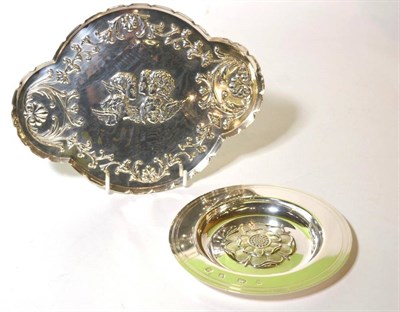 Lot 50 - A silver dressing table tray, Carrs, Sheffield 1992, decorated with winged putti and foliage; and a
