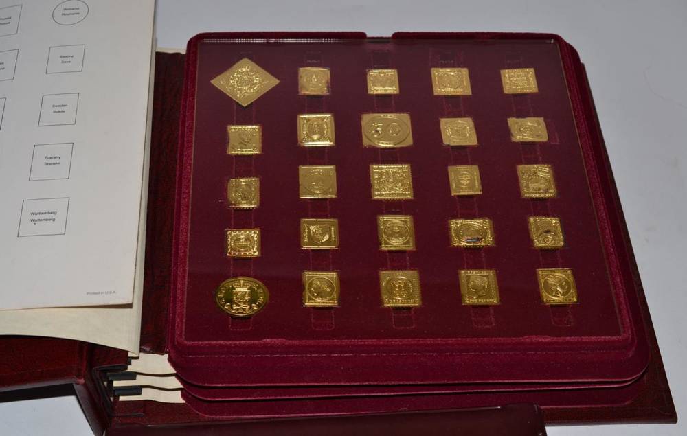 Lot 58 - A collection of silver gilt stamps, International Society of Postmasters, in one album, with a...