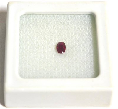 Lot 64 - A loose oval cut ruby, believed to weigh 0.78 carat