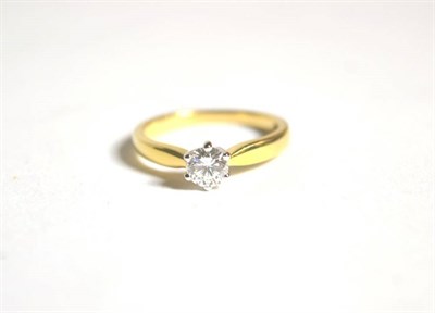 Lot 67 - An 18 carat gold solitaire diamond ring, a round brilliant cut diamond in a claw setting, to...
