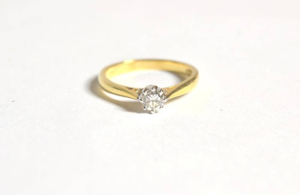 Lot 68 - An 18 carat gold solitaire diamond ring, a round brilliant cut diamond in a claw setting, to...