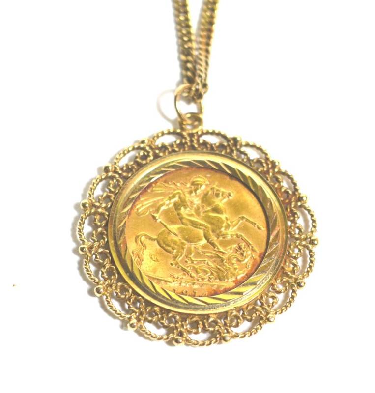 Lot 75 - A 1914 gold sovereign, in later 9 carat gold frame, on 9 carat gold chain, gross weight 19.3g