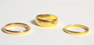 Lot 80 - Three 22 carat gold band rings