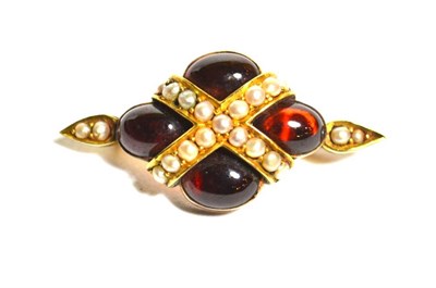 Lot 82 - A cabochon garnet and seed pearl brooch, four oval cabochon garnets crossed by a band of seed...