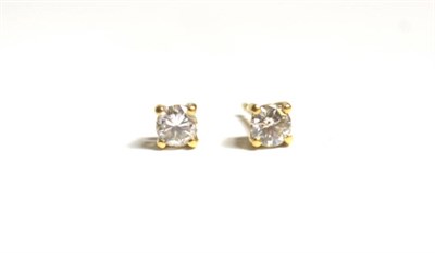 Lot 89 - A pair of diamond single stone ear studs, each approx 0.25 carat