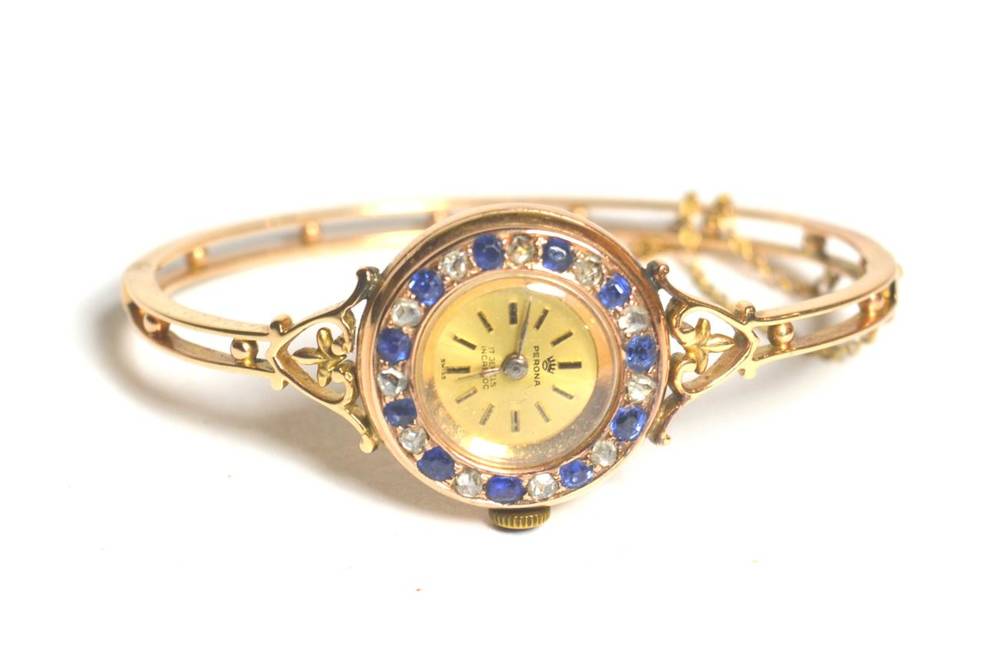 Lot 94 - A sapphire and diamond set lady's wristwatch on bangle